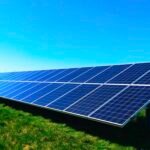 Energy meter and light bulb — tips for how to save money on utilities and lower your bills