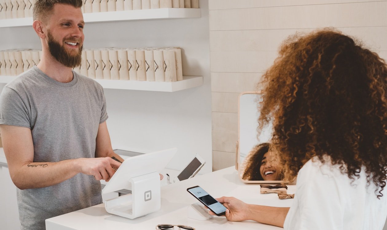 Person resisting impulse buying at shopping mall — how to stop impulse buying and save money