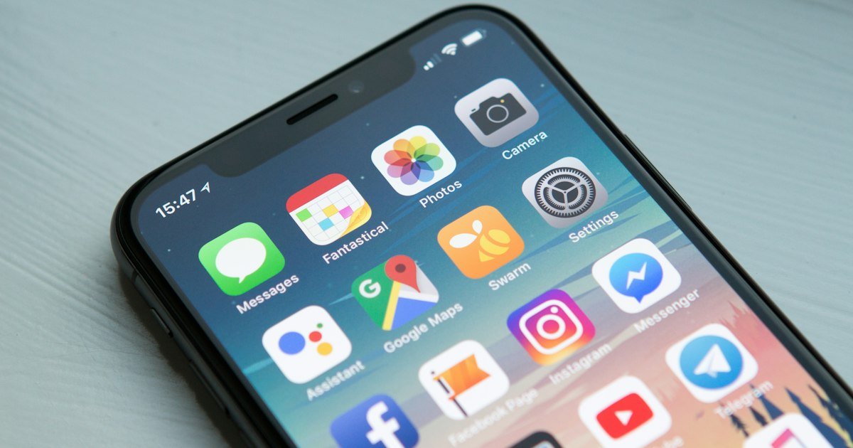 checking credit report on smartphone mobile app 2026